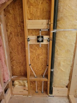 Plumbing parts, tools, and plans used by Seattle's Plumbing LLC.
